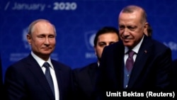 Recep Tayyip Erdogan (sağda) və Vladimir Putin, arxiv fotosu