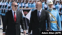 Türkiyə və Azərbaycan prezidentləri Recep Tayyip Erdogan (solda) və İlham Əliyev 